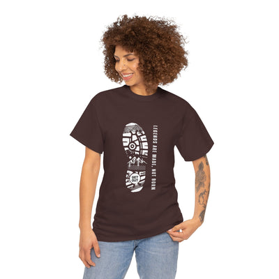 Unisex heavy cotton tee with "Legends are made NOT BORN" design, worn by person.