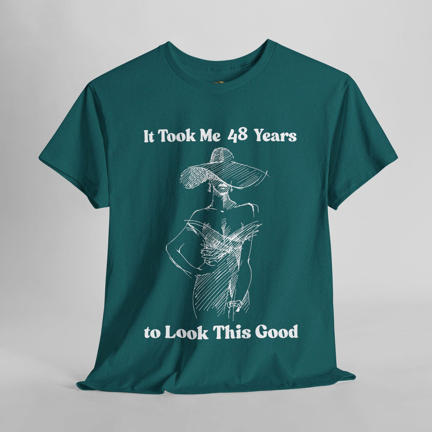 Elegant woman's t-shirt with "It Took Me 48 Years to Look This Good" slogan, featuring chic line art and wide-brimmed hat design. Perfect humorous and stylish birthday gift.