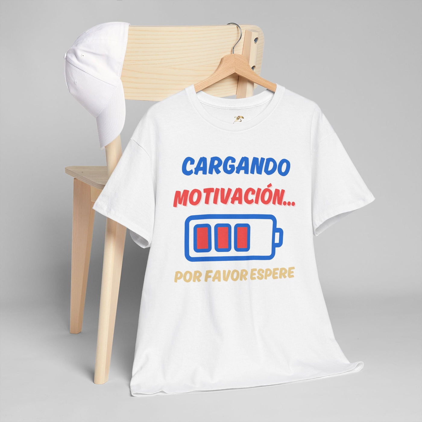 Funny unisex heavy cotton tee with Spanish motivational loading battery graphic.
