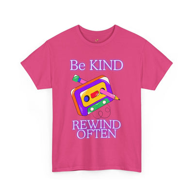 Retro pink T-shirt with "Be Kind, Rewind Often" graphic design, evokes 90s nostalgia and positivity.