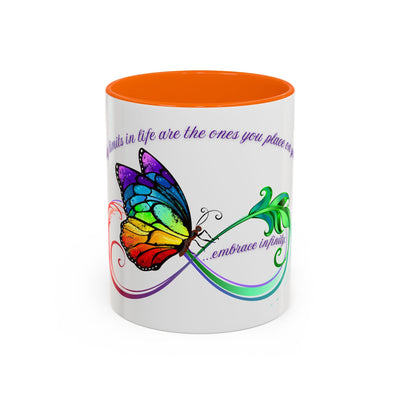 Inspirational Butterfly Coffee Mug with Embrace Infinity design, vibrant colors, and orange interior, perfect for motivational moments.