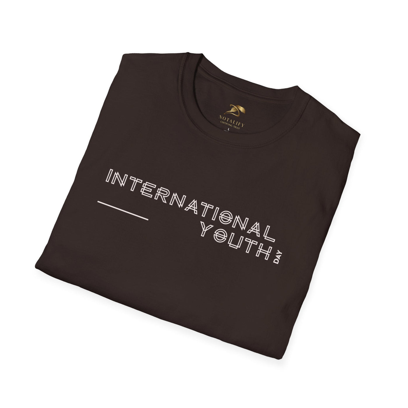 Folded black unisex t-shirt with "International Youth Day" text printed in white, made from 100% ring-spun cotton for youth celebration.