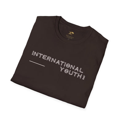 Folded black unisex t-shirt with "International Youth Day" text printed in white, made from 100% ring-spun cotton for youth celebration.