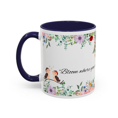 Inspirational ceramic cup with flower design and quote "Bloom where you are planted," perfect for gifts and home decor.
