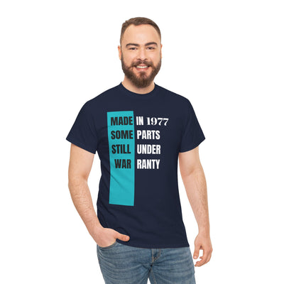 Funny "Made In Some Parts Still Under Warranty" aging t-shirt with vintage style design, humorous birthday gift.