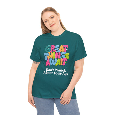 Uplifting "Great Things Await - Don't Panic About Your Age" t-shirt with colorful, playful design and positive message.