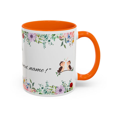 Inspirational ceramic cup with floral design and motivational quote.