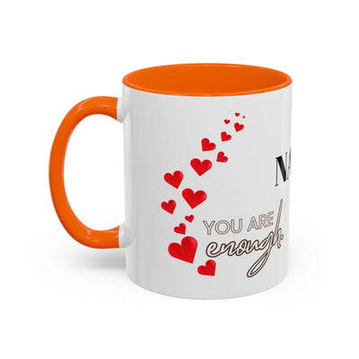 You are Enough Mug with red hearts design, 11oz ceramic, glossy finish, orange interior and handle.