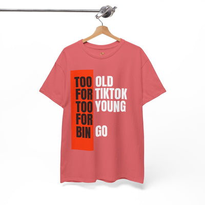 Funny "Too Old For TikTok, Too Young For Bingo" t-shirt for Gen X and Millennials; pink tee with bold black, white, and orange text; perfect for casual wear.