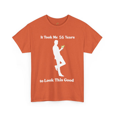 Funny birthday t-shirt with "It Took Me 56 Years to Look This Good" slogan and margarita-holding silhouette.