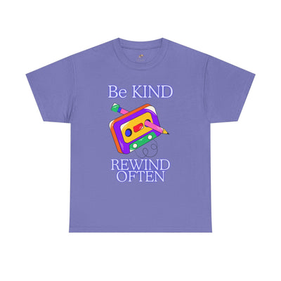 Retro purple t-shirt with "Be Kind, Rewind Often" message and cassette graphic, 90s nostalgia unisex tee.