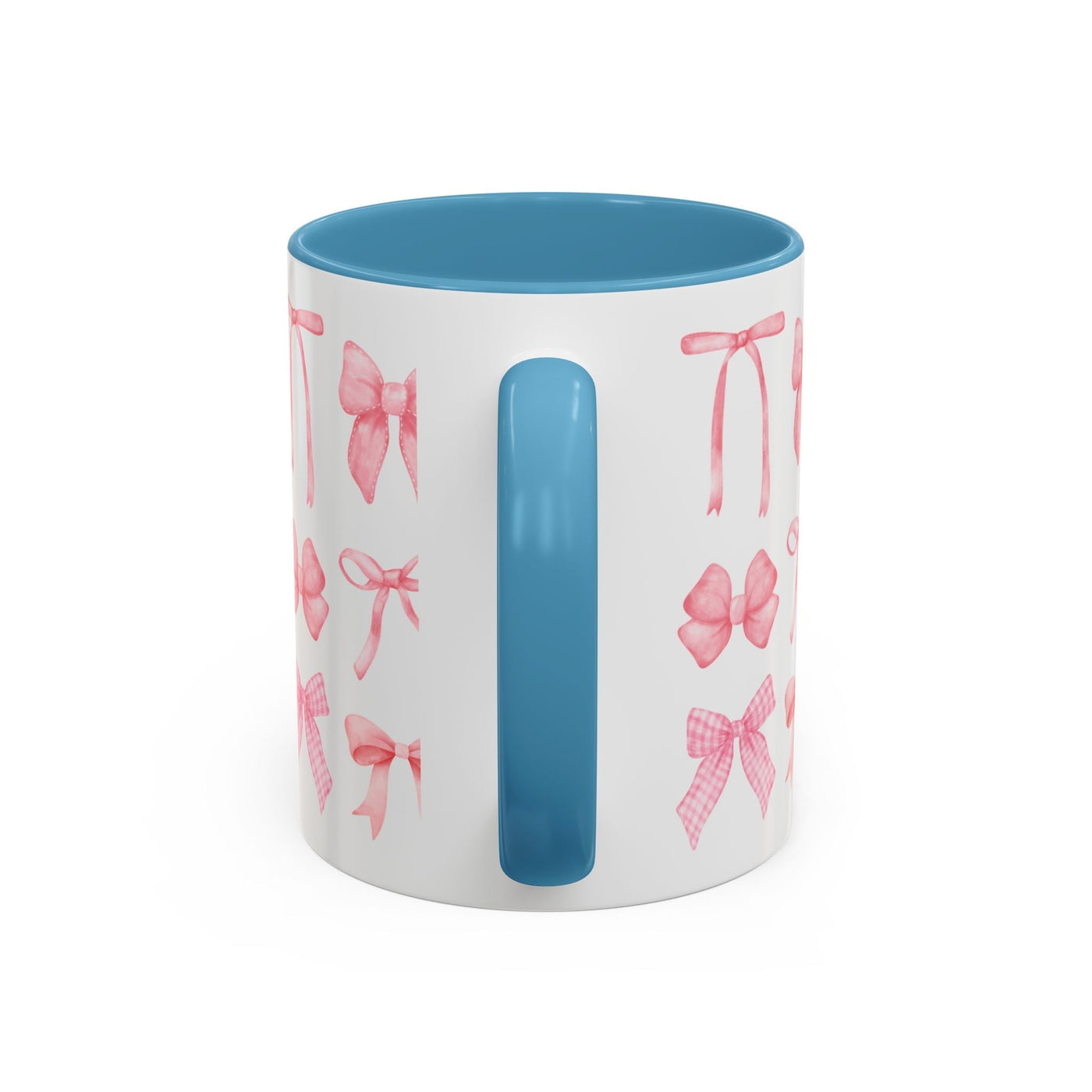 Personalized Mother's Day mug with pink bows and blue interior.