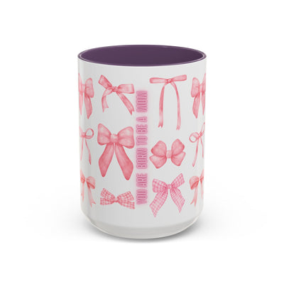 Personalized Mother's Day mug with pink bow design, purple interior, and "Born to be a Mom" text.
