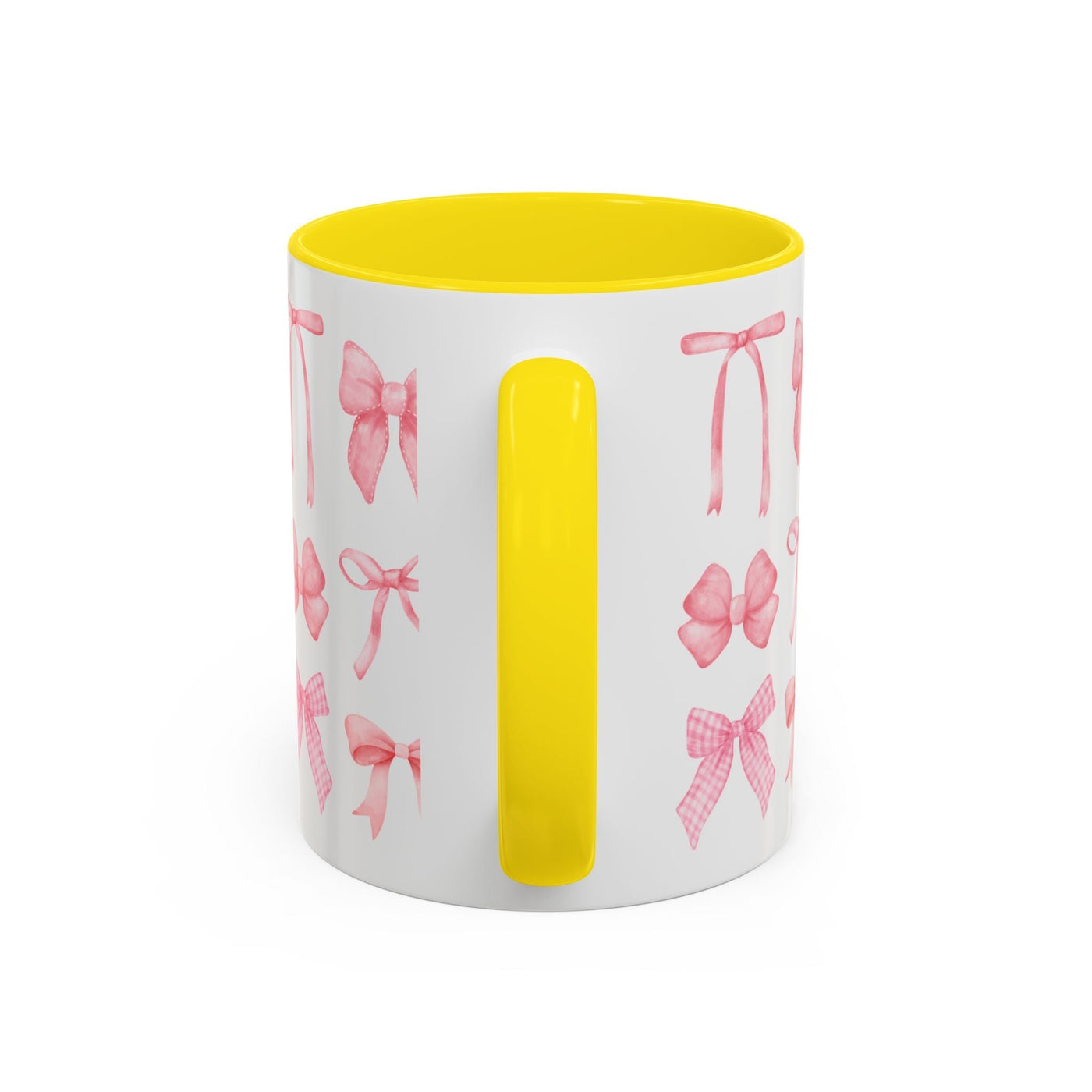 Personalized Mother's Day mug with pink coquette bows and yellow handle.