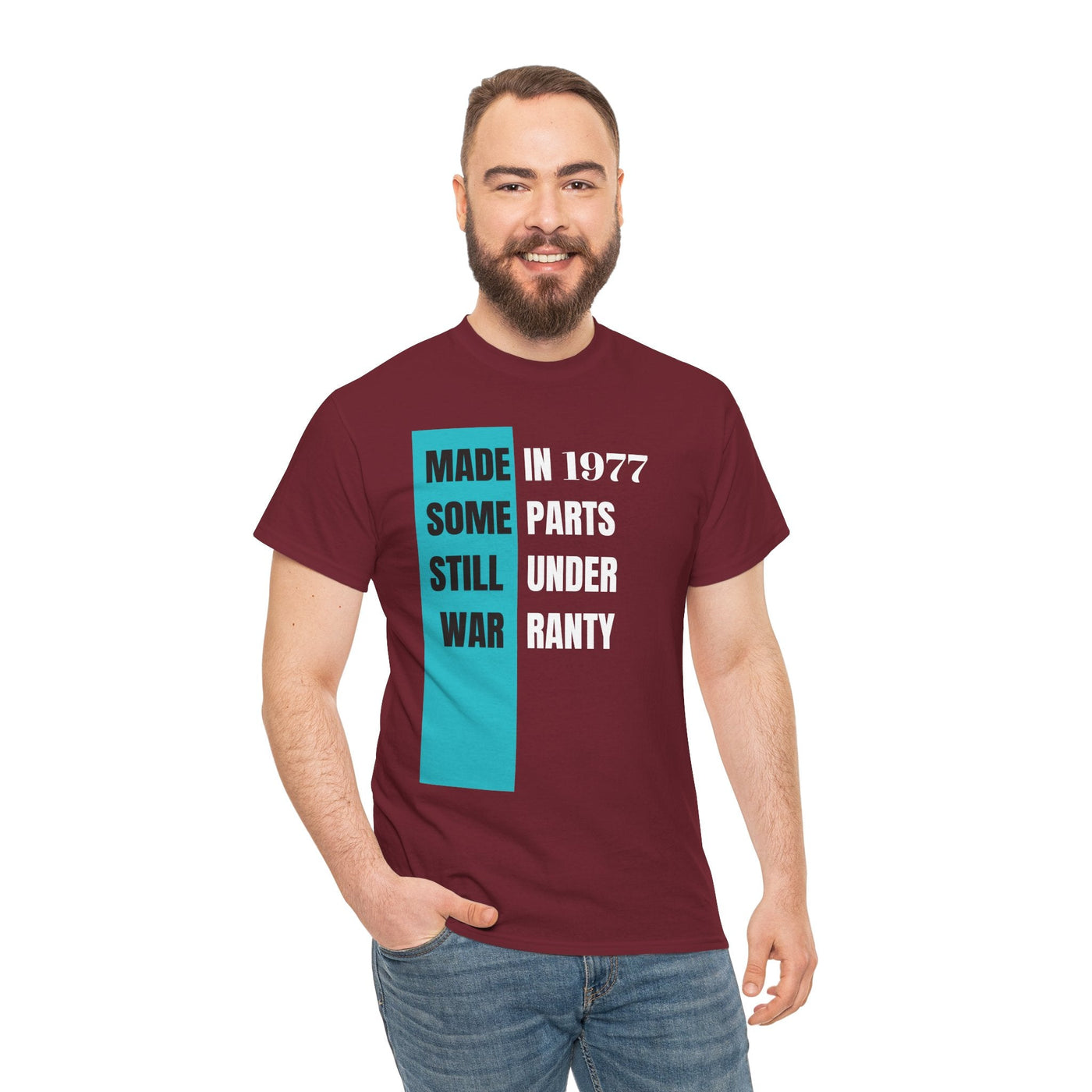 Funny aging t-shirt with "Made In Some Parts Still Under Warranty" slogan, vintage style, humorous birthday gift.