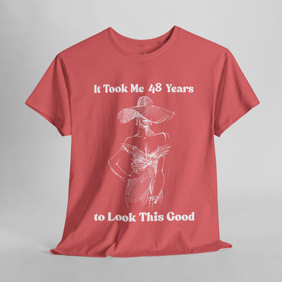 Chic woman's t-shirt with "It Took Me Years to Look This Good" slogan in minimalist style.