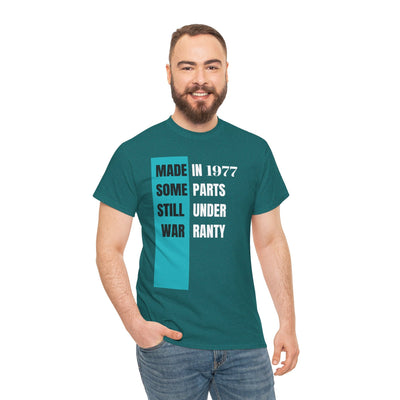 Funny "Made In Some Parts Still Under Warranty" t-shirt with vintage style design, perfect humorous birthday gift for adults.