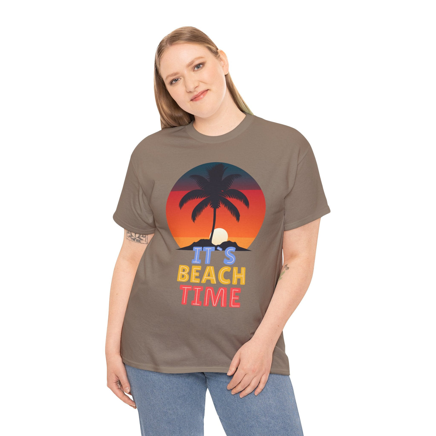 Unisex t-shirt with "It's Beach Time" graphic featuring a sunset and palm tree, perfect for Summer 2025 beach trips.