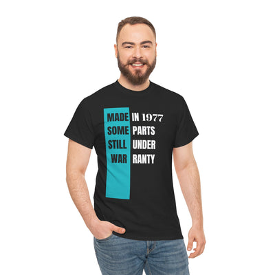 Humorous "Made In Some Parts Still Under Warranty" vintage style t-shirt for birthdays.