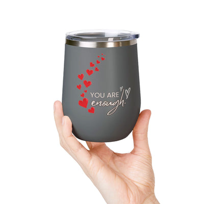 Positive affirmation wine tumbler with "You're enough" text, 12oz stainless steel, insulated cup with red hearts design.