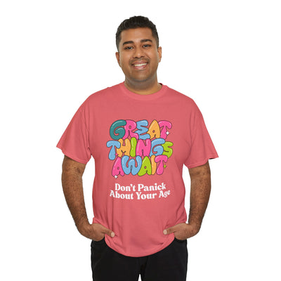 Positive vibes t-shirt with "Great Things Await" message in colorful bubbly font, promoting optimism about aging.
