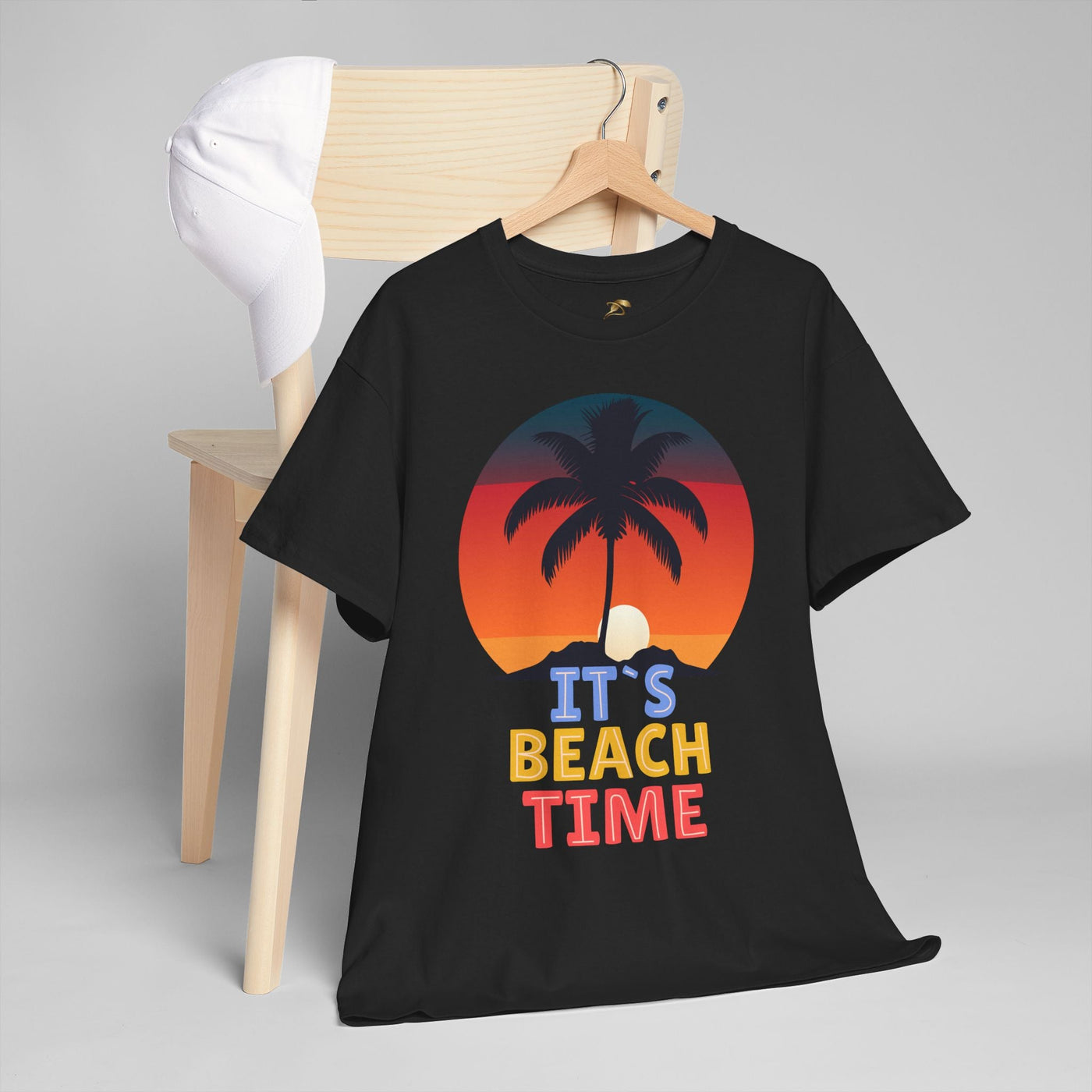 Unisex summer T-shirt with "It's Beach Time" graphic featuring sunset, palm tree, and tropical vibes for 2025 vacations.