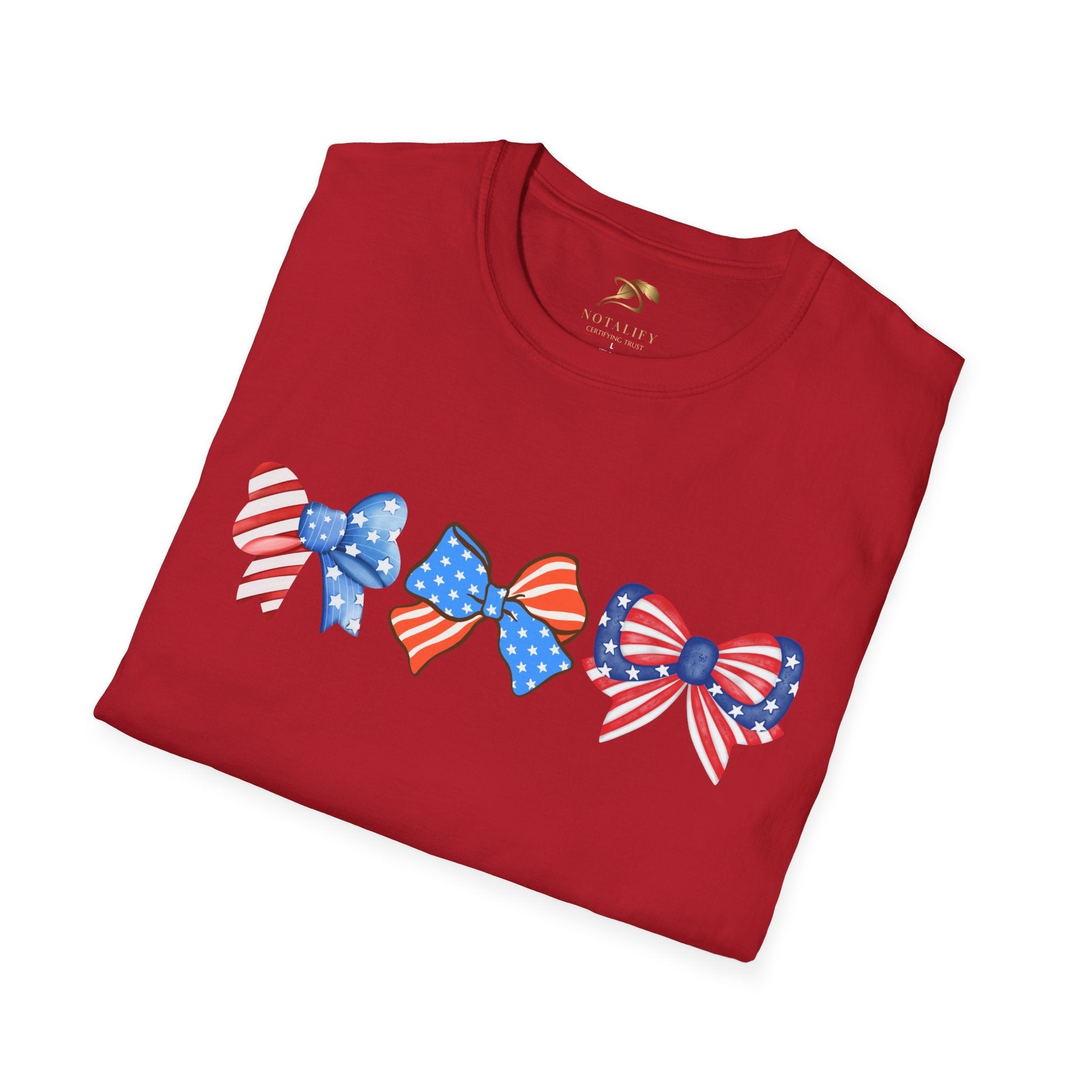 Coquette Patriotic T-Shirt featuring colorful bow designs on a red background, perfect for 4th of July celebrations and casual use.