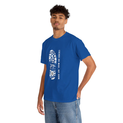 Unisex heavy cotton tee with "Legends are made NOT BORN" graphic design, inspirational gender-neutral top.