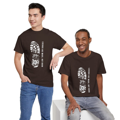 Unisex heavy cotton tee with "Legends are made NOT BORN" message, black graphic design, worn by diverse models.