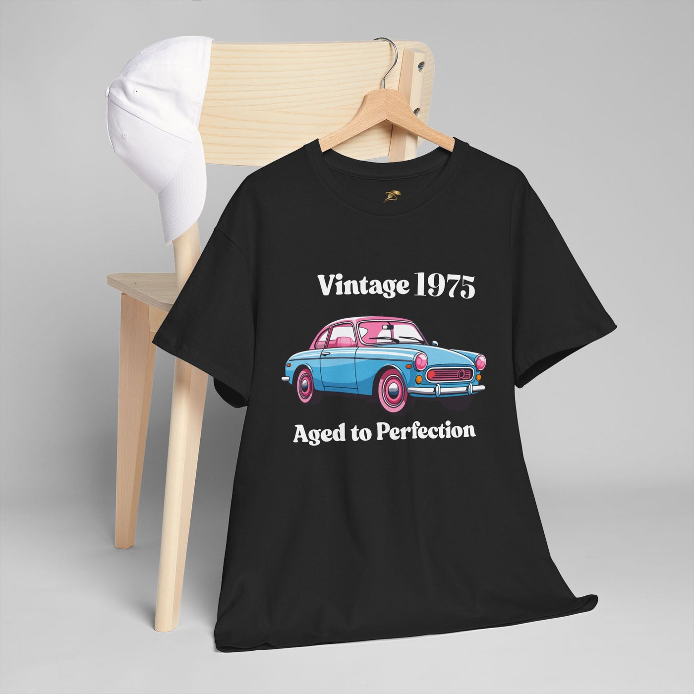 Vintage Aged to Perfection classic car t-shirt on a hanger with a retro car graphic, perfect for car enthusiasts and birthdays.
