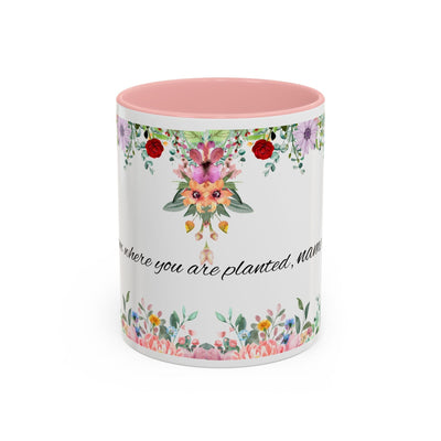 Inspirational ceramic cup with flower design and quote "Bloom where you are planted", ideal for home or office decor.