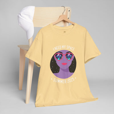 Astronaut Space Vibes Tee with galaxy graphic and "I Need My Space" design hanging on chair.