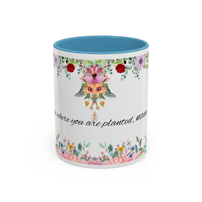 Inspirational ceramic cup with floral design and quote "Bloom where you are planted" ideal for gifts and home decor.