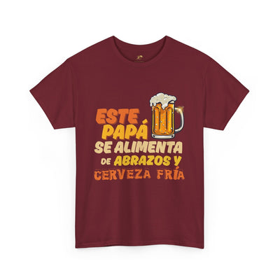Funny Spanish Dad Beer Shirt with text "Este Papá Se Alimenta de Abrazos y Cerveza Fría" in bold, playful font and a frosty beer mug graphic. Ideal for Father's Day.