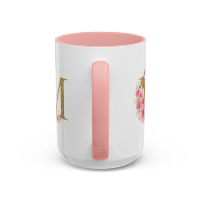 Mother's Day mug with floral design and pink interior and handle.