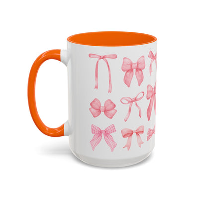 Personalized coquette bow coffee mug for Mother's Day, vibrant design, orange interior and handle.
